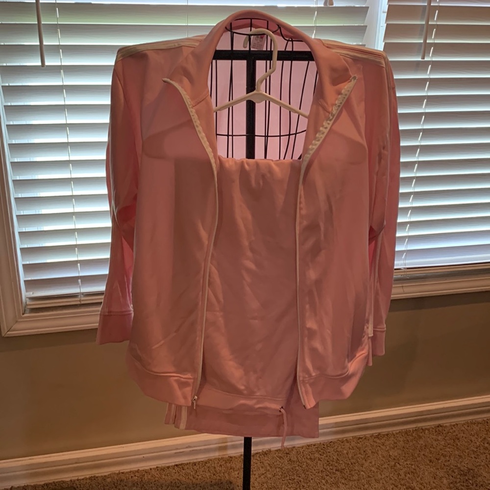 Pink and white strip jog suit.